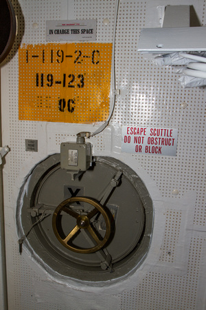 Scuttle hatch for information center